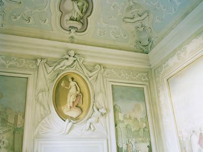 Villa Cornaro interior wall sculpture above doorway brighter lighting.