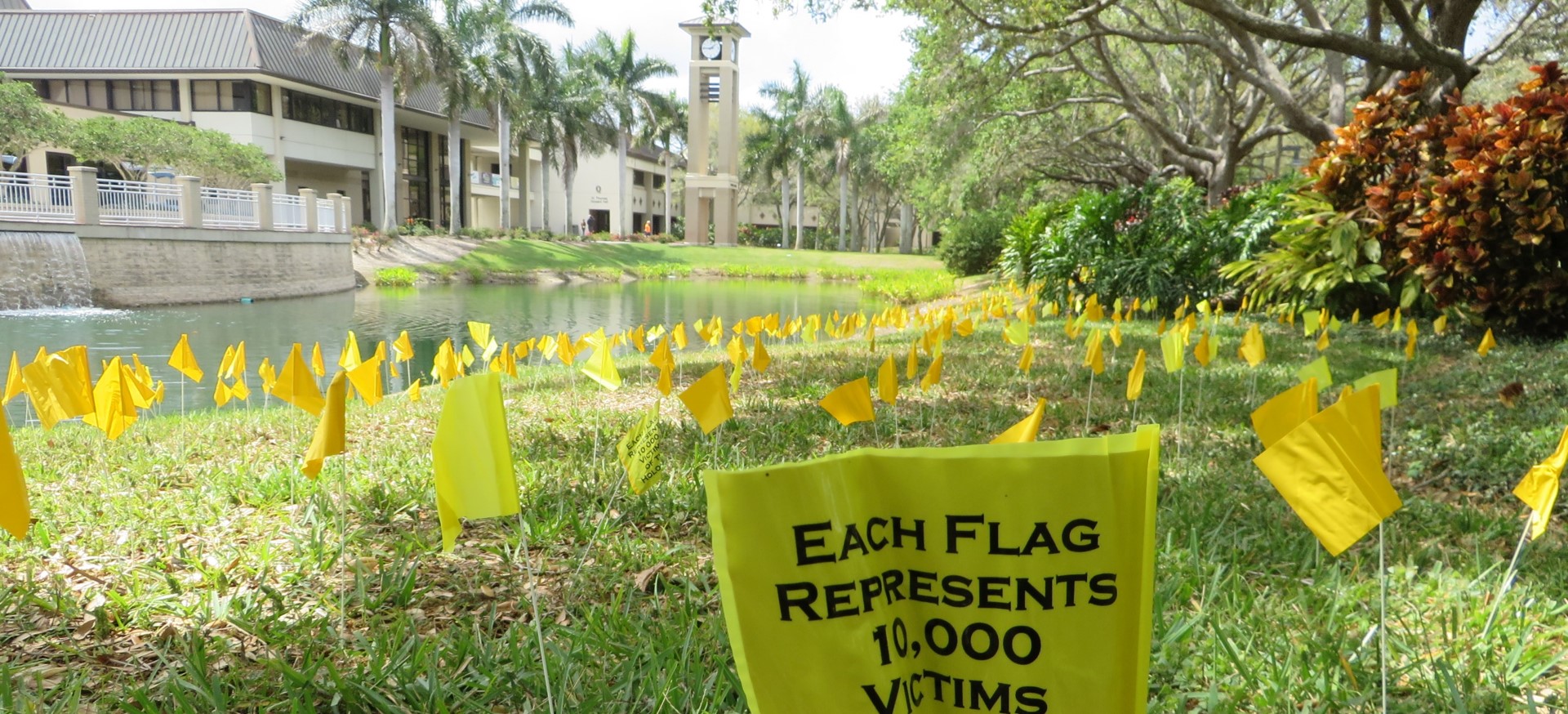 Holocaust Memorial Week field of flags each yellow flag represents ten thousand victims of the Holocaust.